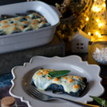 Crespelle al nero di seppia con salmone e cavolo nero