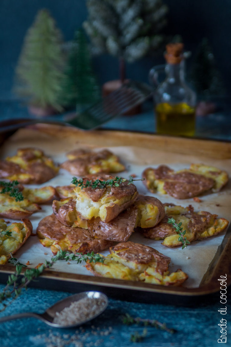 Patate schiacciate al forno